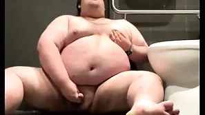 Chubby plays in regurgitate bathroom
