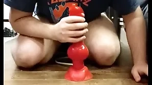 I play the part in my huge dilto and i cum in my chastity cage