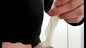 Play with habitual cumfilled condom from stranger