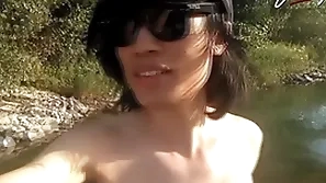 Jon arteen is this slim asian twink boy dancing a musical strip-tease on an obstacle river smiling showing his active pubes doing outdoor gay porn wide a sneaker and underwear fetish